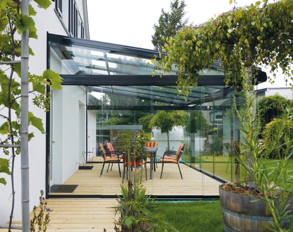 Sommergarten, Terrassenüberdachung mit Ganzglas-Schiebeanlage